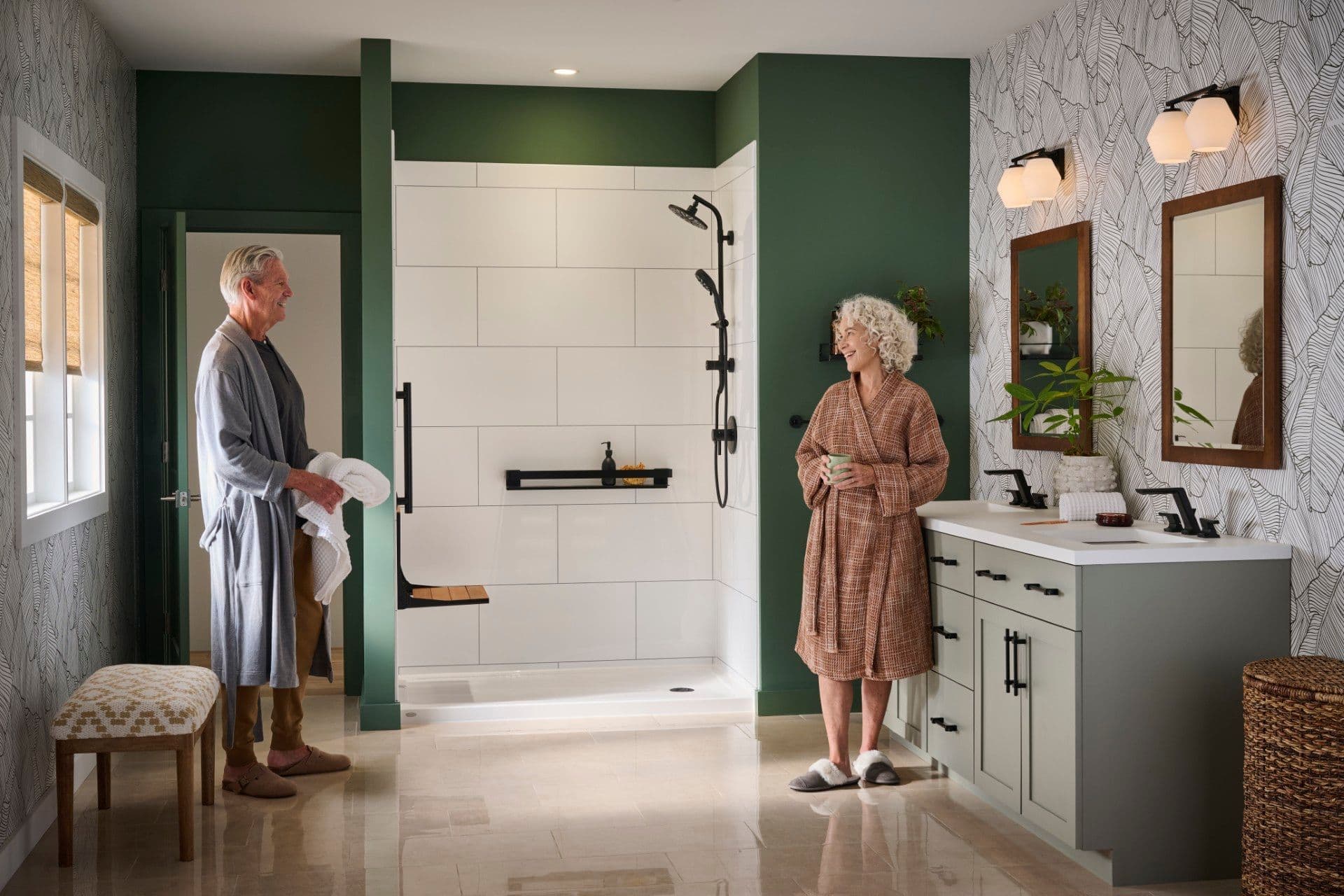 A senior couple in robes enjoying their remodeled bathroom with a new walk-in shower